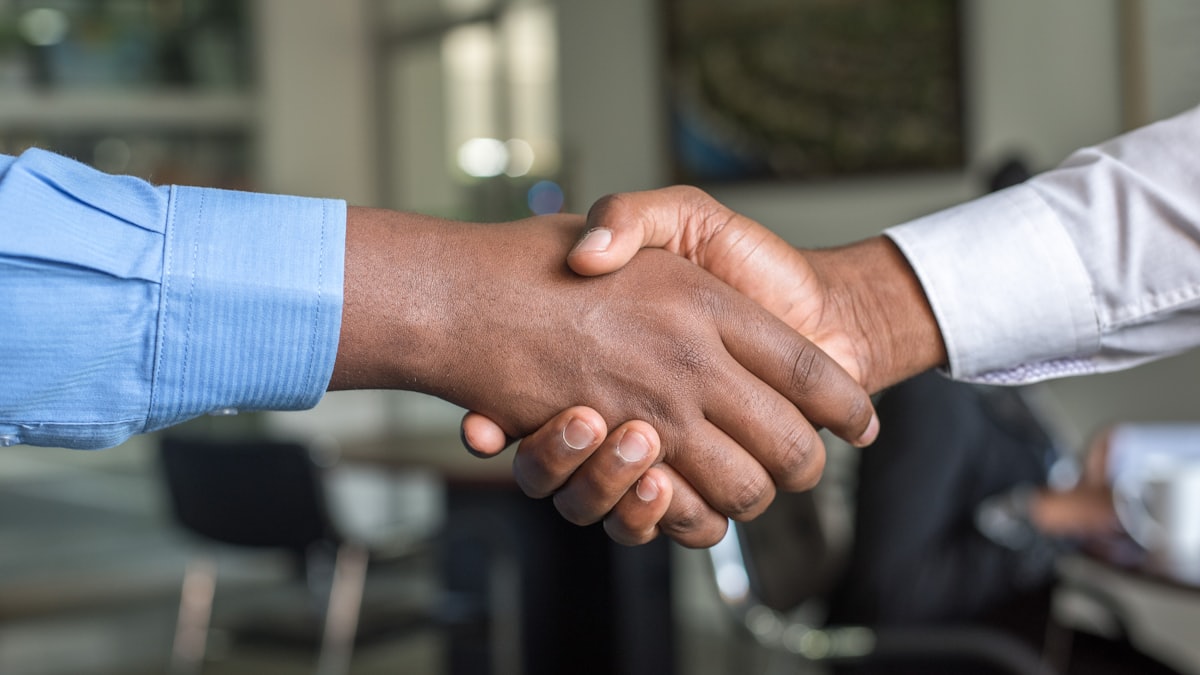 Manager interviewing a candidate in a restaurant