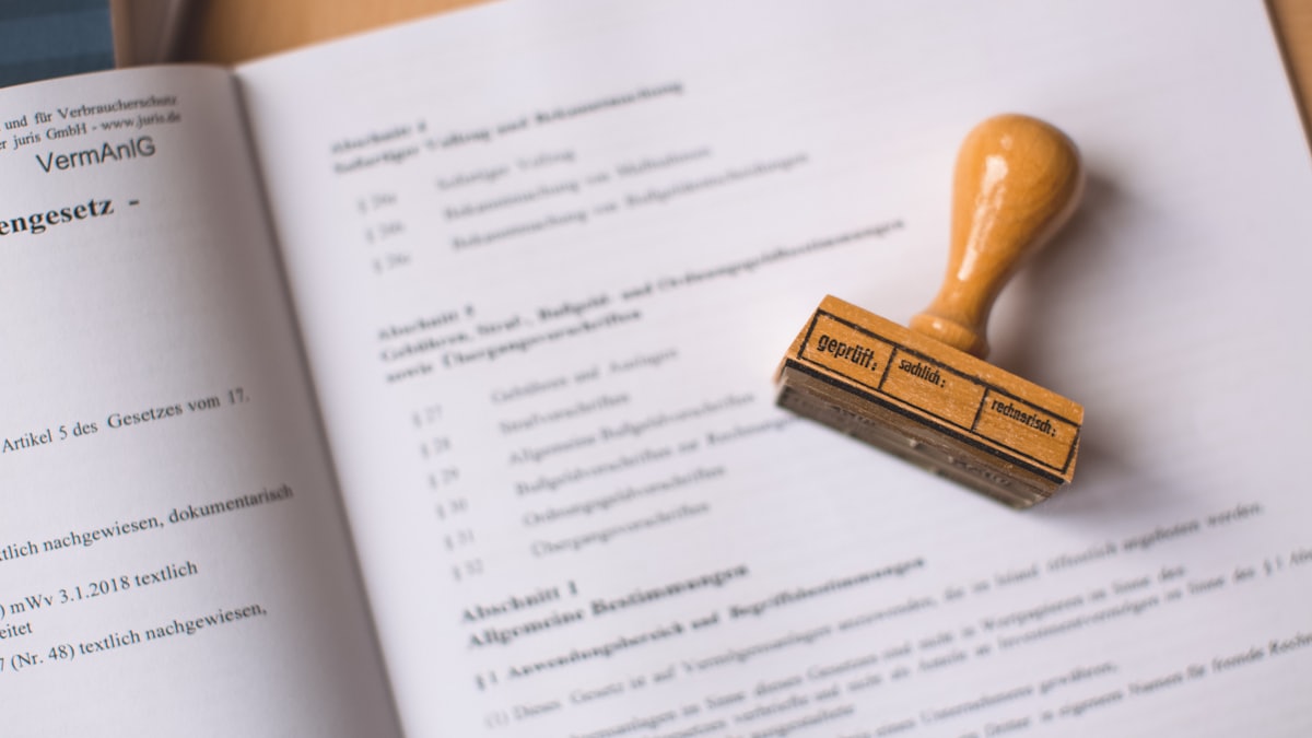 Restaurant compliance documents and registrations on a desk