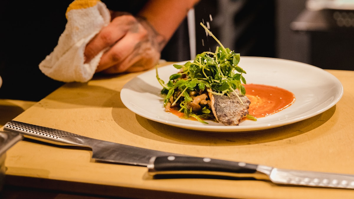 Portioned ingredients weighed into equal servings on a stainless steel counter