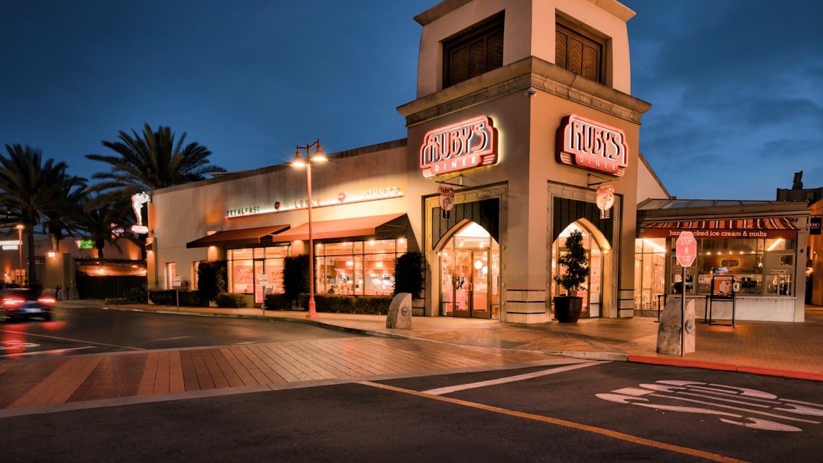 Branded restaurant franchise storefront on a busy street