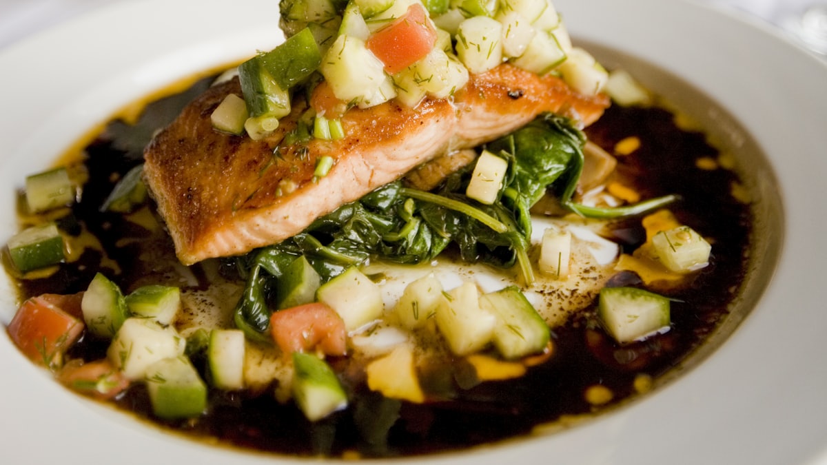 A beautifully designed restaurant menu with dish descriptions